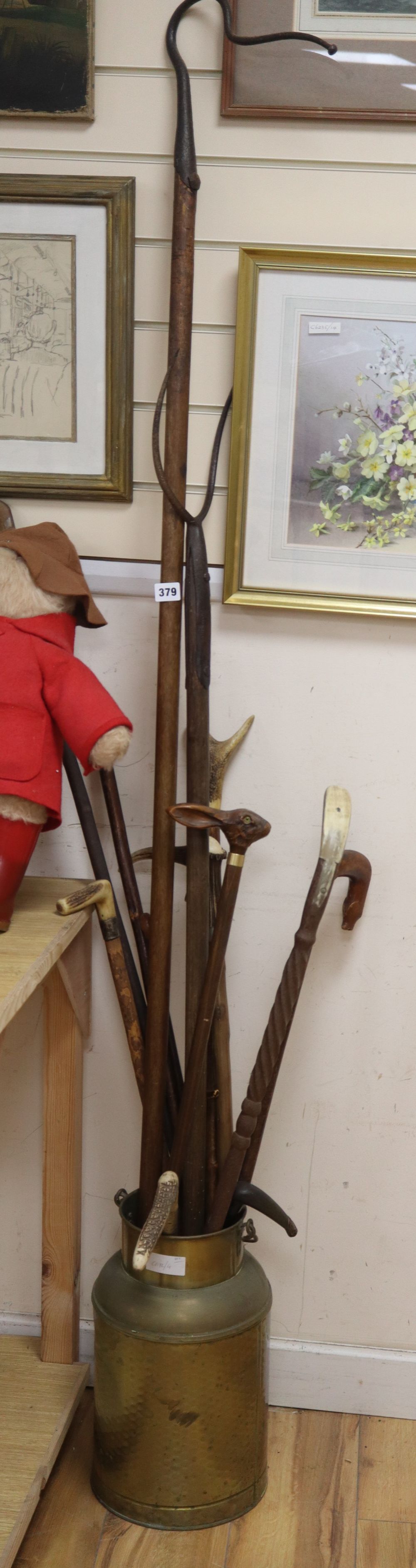 Assorted horn handled and other walking canes and shepherds crooks